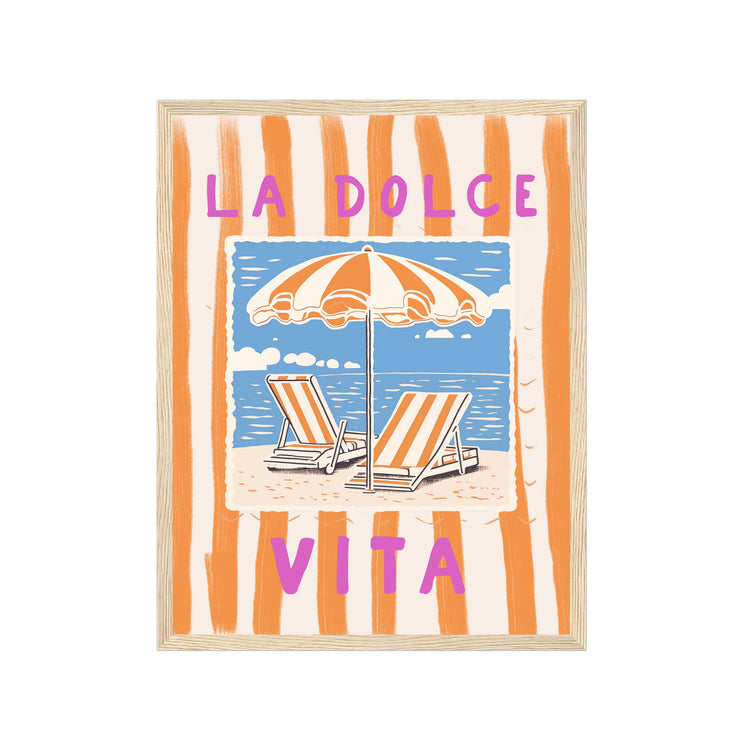 Framed artwork with beach scene, lounge chairs, and umbrella with 'La Dolce Vita' text.
