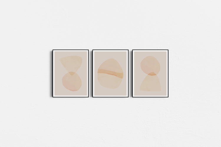 Three abstract art prints with geometric shapes on a white background