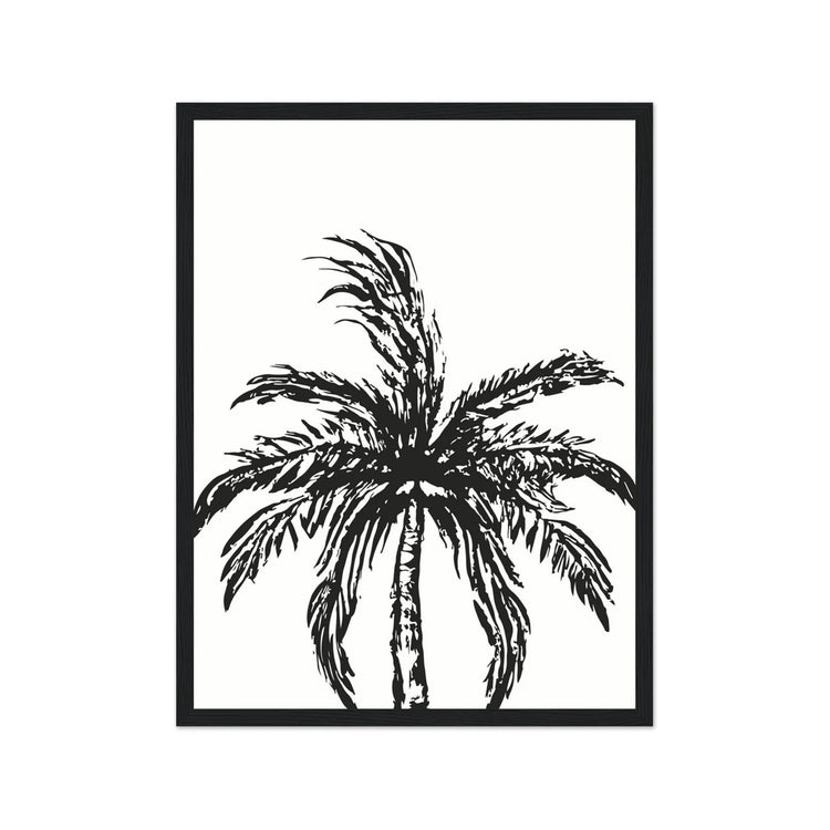Framed black and white palm tree art print on a white background