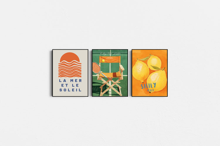 Three framed artworks on a white background