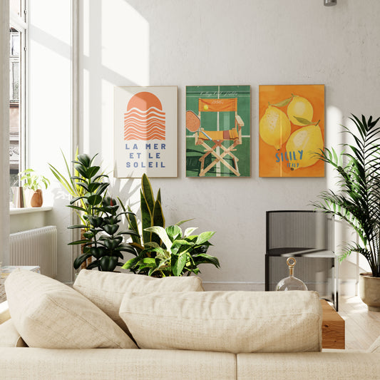 Modern living room with a beige sofa, plants, and colorful wall art.