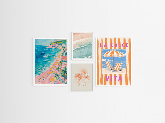 Set of four framed beach-themed artworks on a white wall