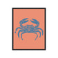 Framed artwork of a blue crab on a peach background