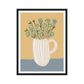 Framed artwork of a white mug with flowers on a beige and blue background
