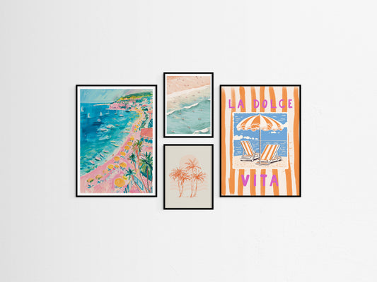 Set of four framed beach-themed artworks on a white wall