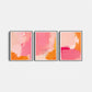Three abstract art prints with pink and orange colors on a white background