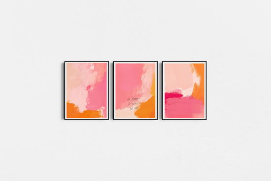 Three abstract art prints with pink and orange colors on a white background