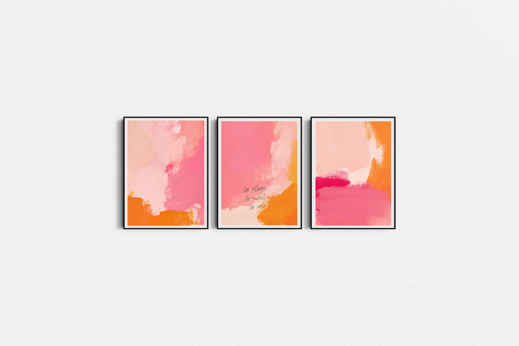 Three abstract art prints with pink and orange colors on a white background