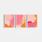 Three abstract art prints with pink and orange hues on a white background