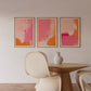 Modern interior with abstract art on the wall and a wooden table with chairs.