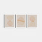 Three abstract art prints with geometric shapes on a white background