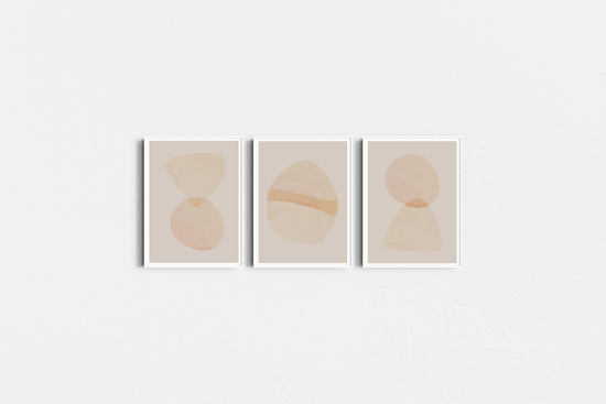 Three abstract art prints with geometric shapes on a white background