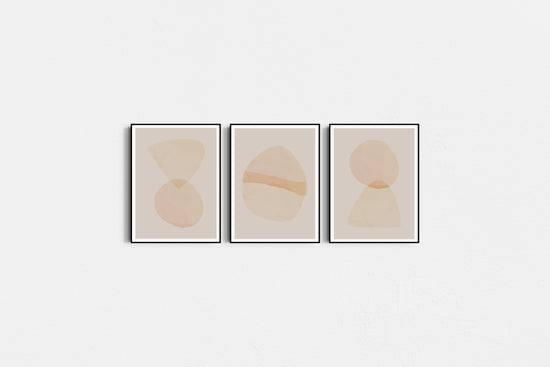 Three abstract art prints with geometric shapes on a white background