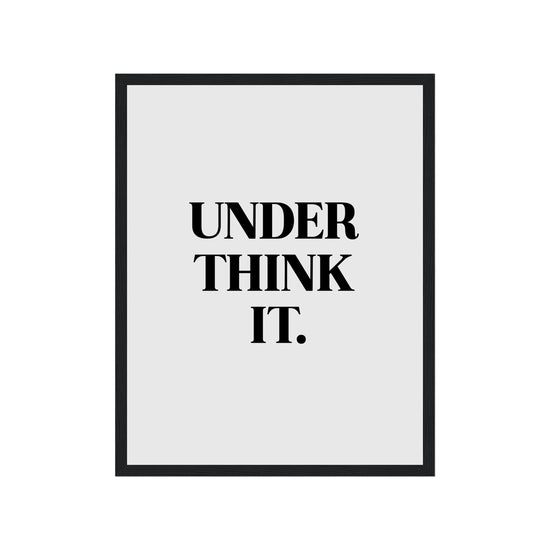 Framed poster with text 'UNDER THINK IT.' on a white background